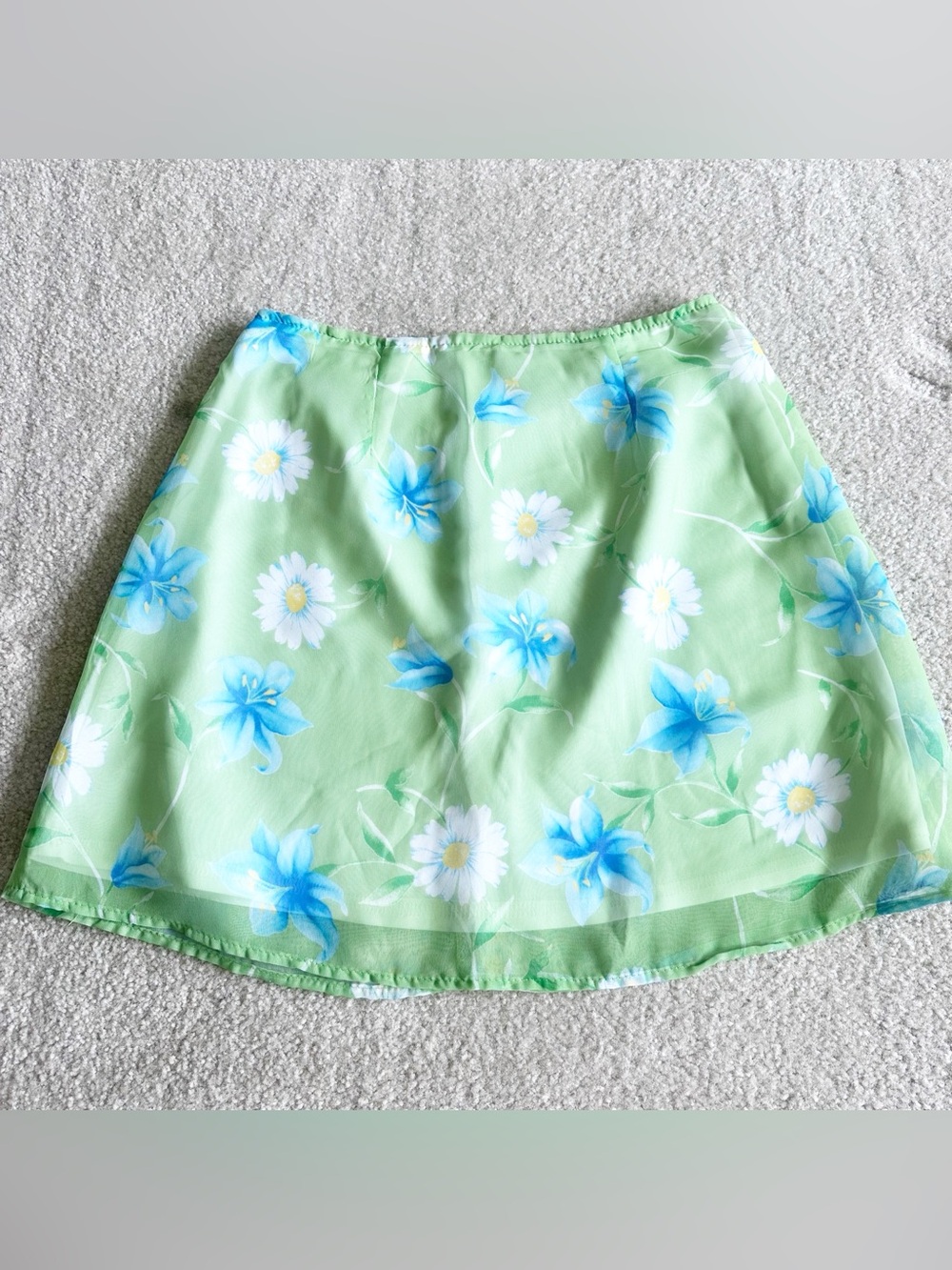 Vintage paper tag Green floral mini skirt with white lining size 5
